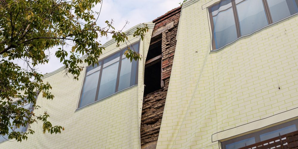 old brick house covered with decorative fabric 2024 10 12 09 43 21 utc